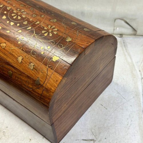 Vintage wooden chest with brass inlay used