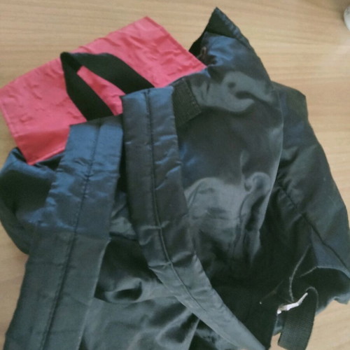 Backpack used with colorful cheerful designs and two front pockets