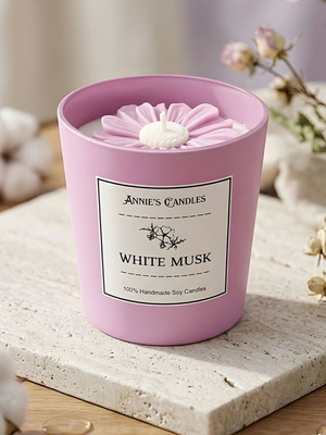 Handmade soy scented candle with flower in lilac glass, made to order