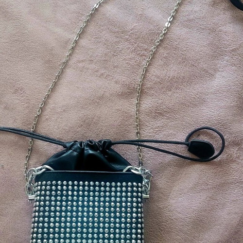 Shoulder bag like new, small black with shiny silver ornaments