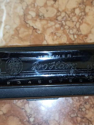 Hohner harmonica used with case