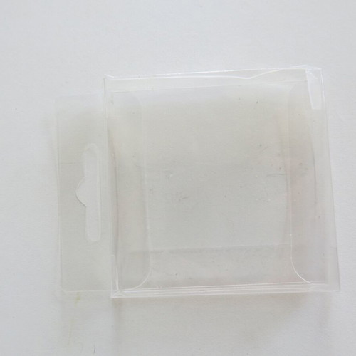 Plastic transparent cases used for figures and Game Boy