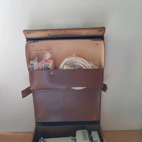 Russian projector used with leather case and film