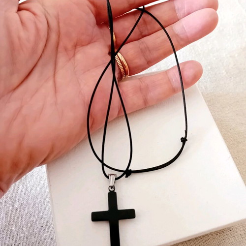 Double-sided cross with black adjustable cord like new, stainless steel