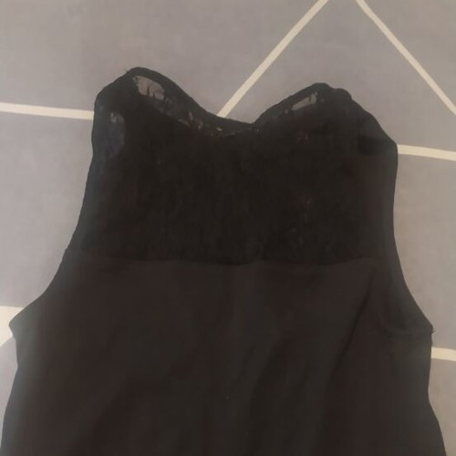 Black top with lace details like new, tight fit