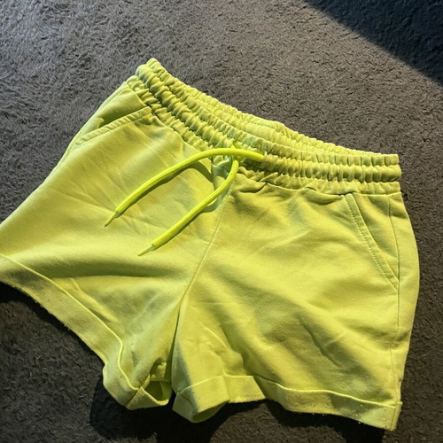 Yellow-green shorts with fluorescent drawstrings