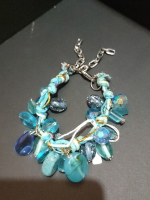 Handmade bracelet like new with blue stones and transparent elements