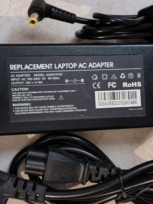 Laptop power adapter new without packaging