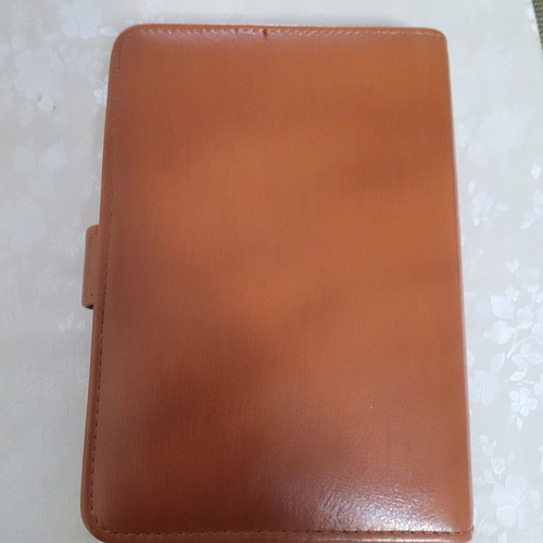 Agenda new in excellent condition with card slots and notepad