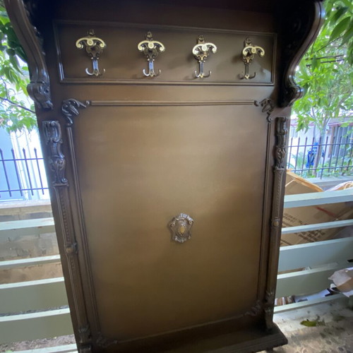 Vintage wooden hall tree with carved details, like new