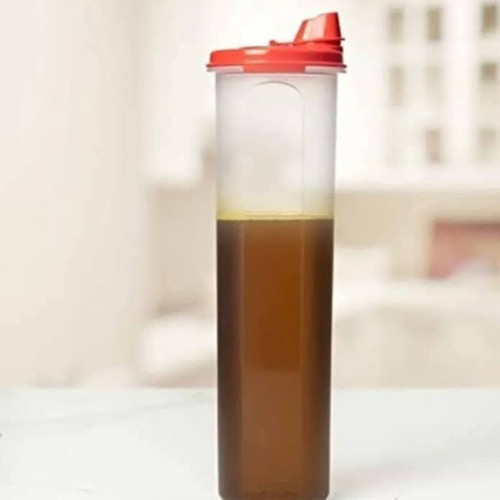 Tupperware 1.1L oil dispenser with measuring cap, new