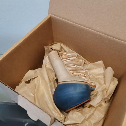 Handmade clay vase used with wavy finish