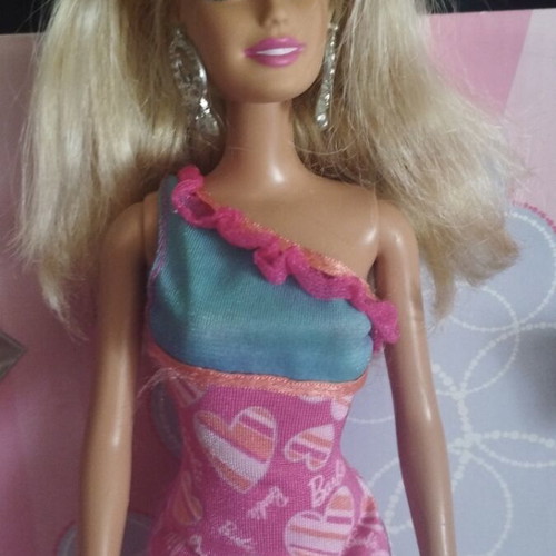 Barbie doll with 2012 Budget Heart Dress Glitz Barbie outfit