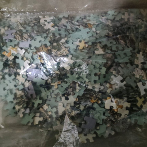 Puzzle used 1000 pieces with snowy city theme