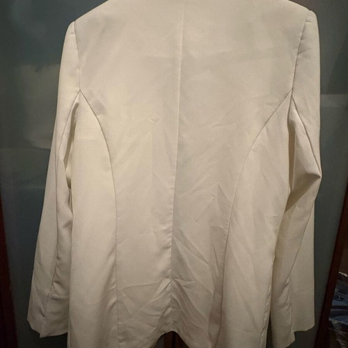 White jacket like new with shoulder pads, no pockets, belt, size M