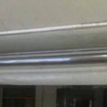 Vertical transparent PVC awnings used with mechanism for cafes and restaurants