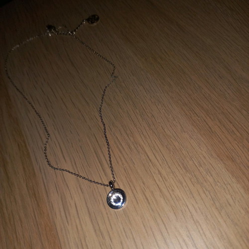 Ozze necklace new, silver color