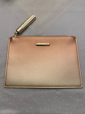 Michael Kors rare collectible clutch new, gold ombre with tassel