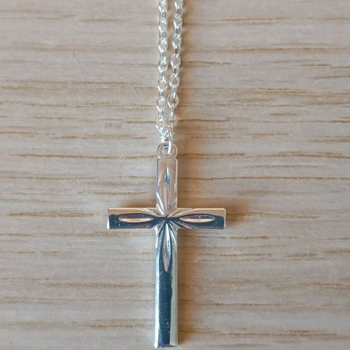 Steel cross like new, silver color