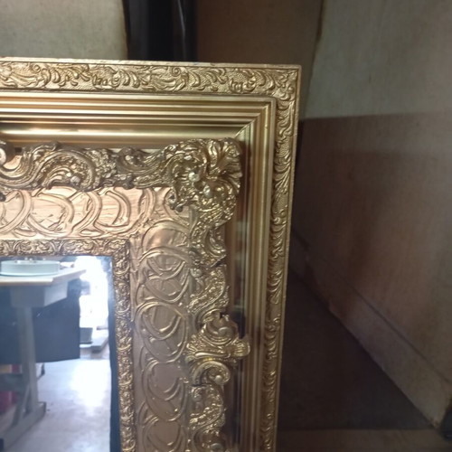 Vintage retro mirror with carved ornate gold frame used