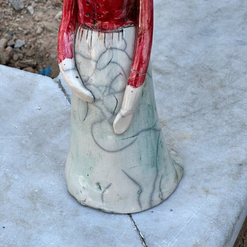 Handmade artistic ceramic woman statue used with rustic style