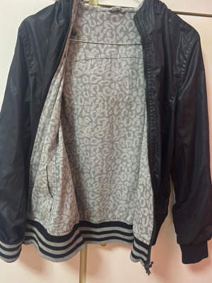 Women's black jacket like new, warm lined, windproof, short cut
