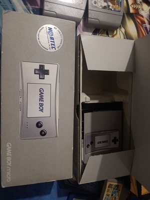 Game Boy Micro like new with 3 games, original packaging and charger