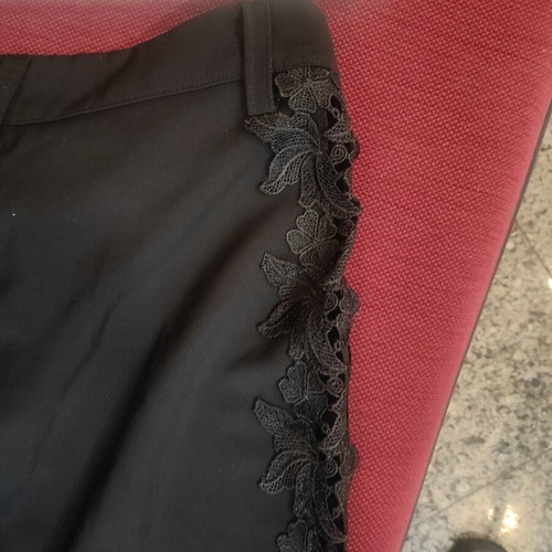 Pants black with lace side openings, like new, size M
