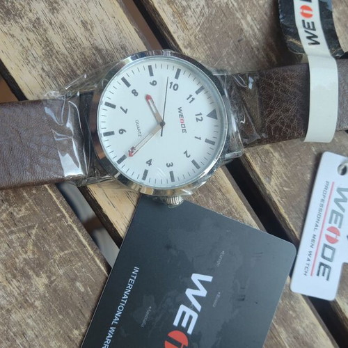Weide wristwatch unisex like new, brown leather strap