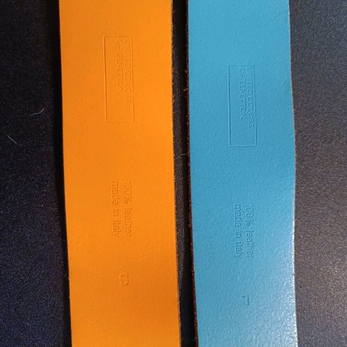 Three Benetton belts used, two leather and one fabric