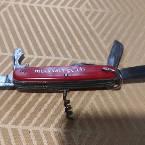 Colonial Swiss Master red multitool knife used