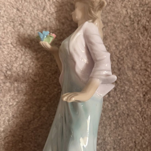 Porcelain figurine doll like new, height 25 cm