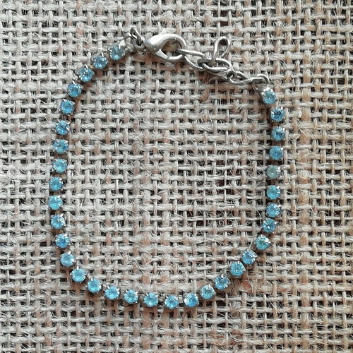 Steel bracelet new silver color decorated with blue zircon