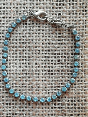 Steel bracelet new silver color decorated with blue zircon