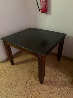 Wooden Art Deco dining table used with carved legs