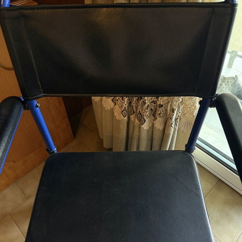 Bathroom wheelchair with bucket and cushion