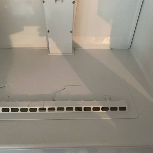 Pitsos refrigerator used with plastic freezer crack