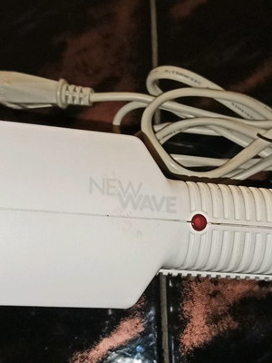 New wave kitty hair straightener used with three different plates