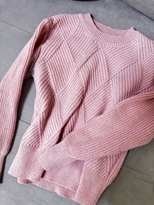 Pink knitted women's sweater