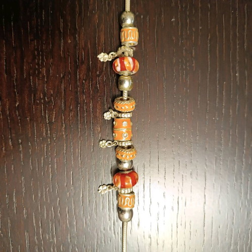 Necklace with charms like new, 45cm length, orange and silver