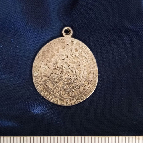 Silver pendant Phaistos disc used