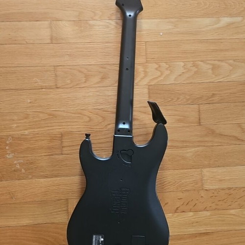 Drums Logitech, Guitar Hero guitar, microphone and 5 used PlayStation 3 games