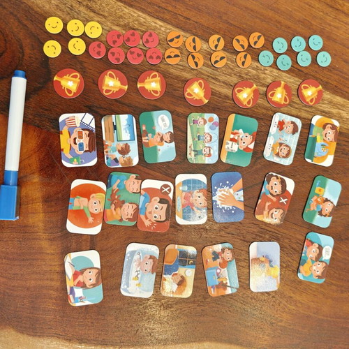 Magnetic reward chart used with 57-piece educational set