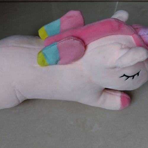Plush unicorn in pastel colors like new