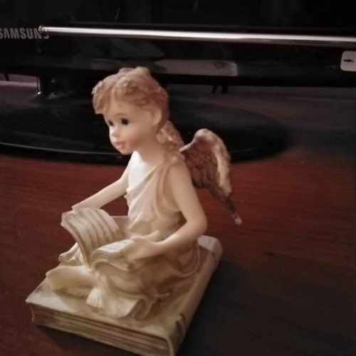 Angel figurine beige color like new