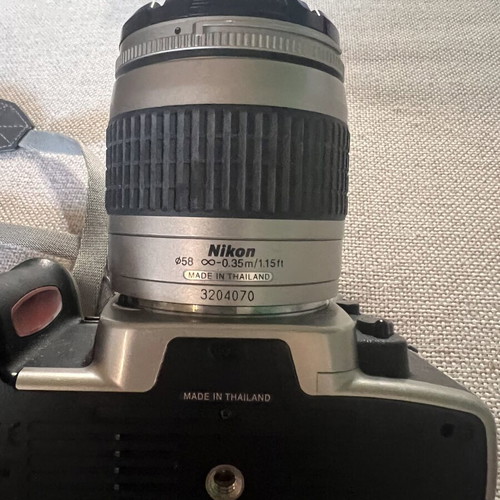Nikon F65 SLR 35mm camera with AF Nikkor 28-80mm lens and Delsey case