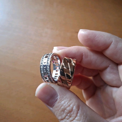 Stainless steel rings like new, pink and gold colors