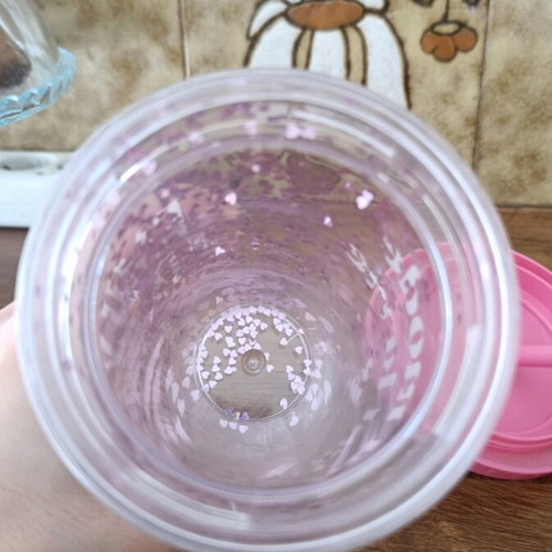 Plastic water bottle pink with designs and glitter, new