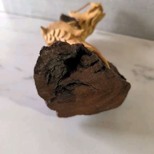 Wooden handmade dragon used with wooden base
