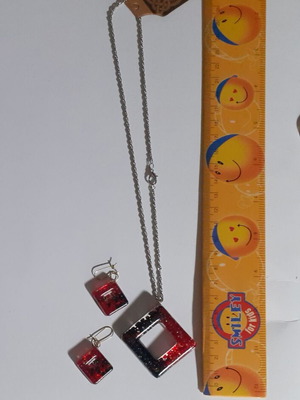 Two sets of handmade pendants and earrings, multicolor